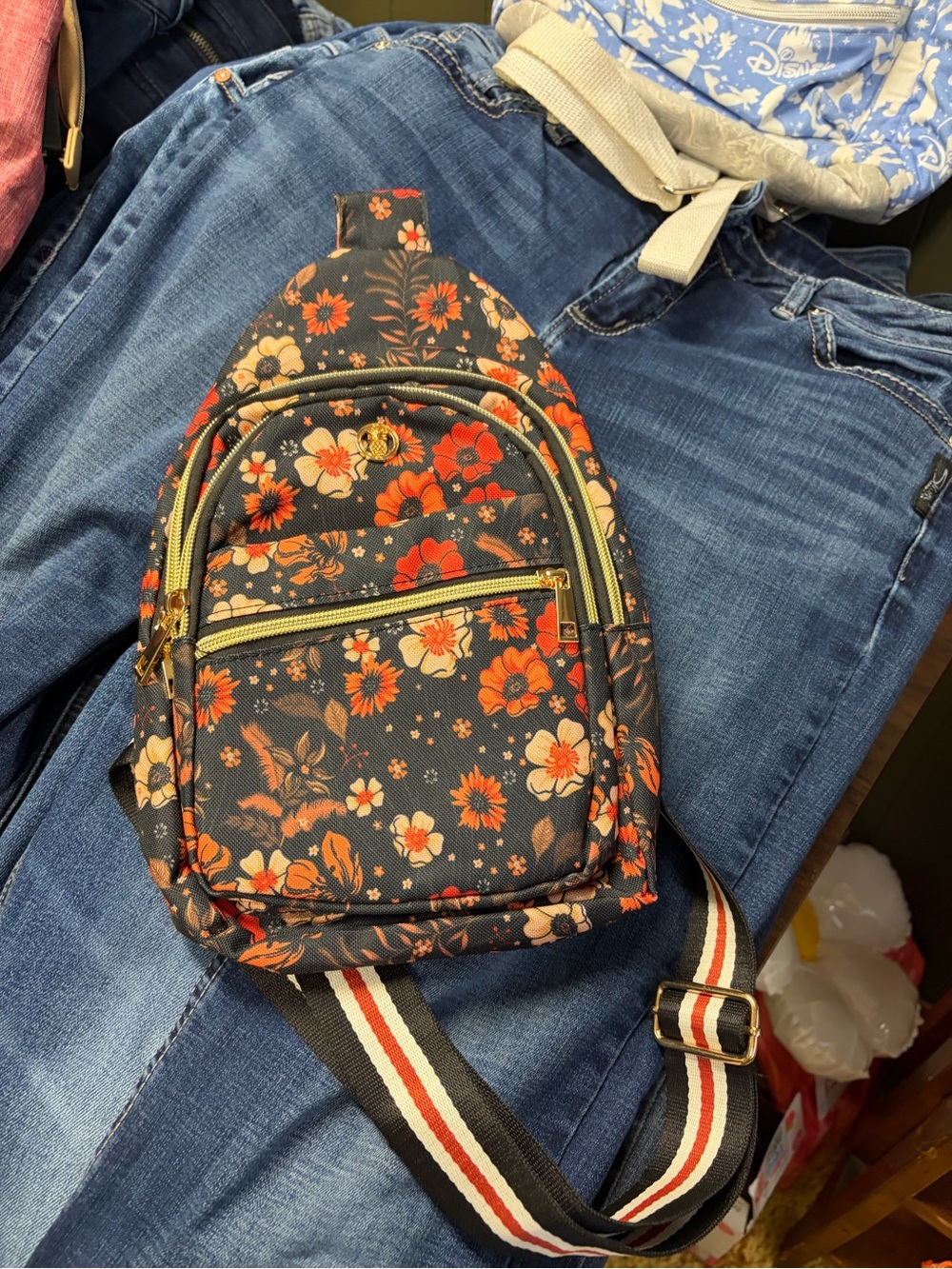 Simply Southern Black Floral Sling Backpack with Orange and Cream Flowers